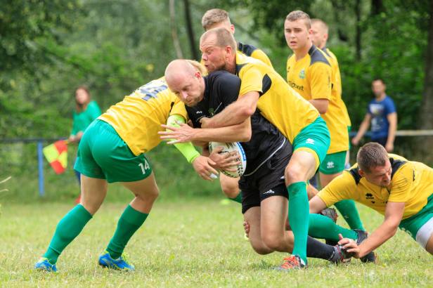 Julius, flanker at the Rugby Klub Bratislava, taken by three Zilina players