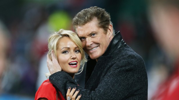 Actor and singer David Hasselhoff hugs welsh wife Hayley Roberts during the 2015 RWC